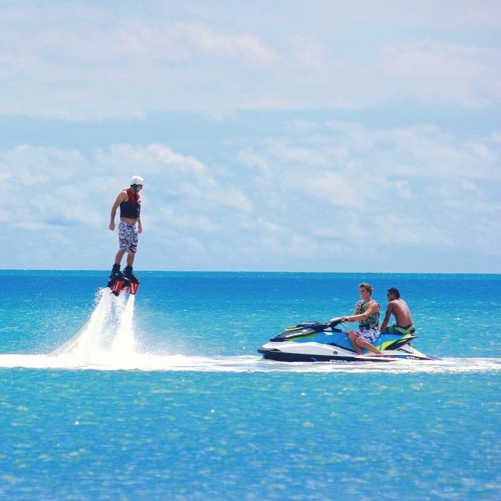 a man riding a jet ski in the water